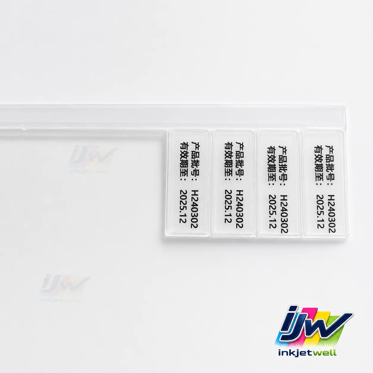 Black batch number and expiry date printed repeatedly on clear molded plastic compartments